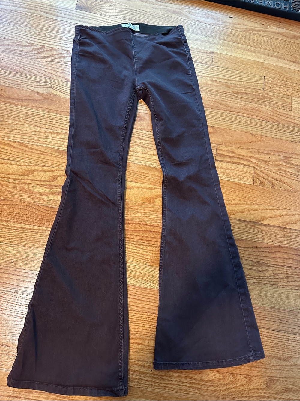 We The Free Flared Jeans in Dark Brown